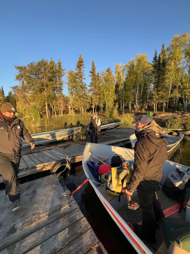 Loading the boats at the outpost dock for a morning of lake trout fishing on Kamuchawie Lake