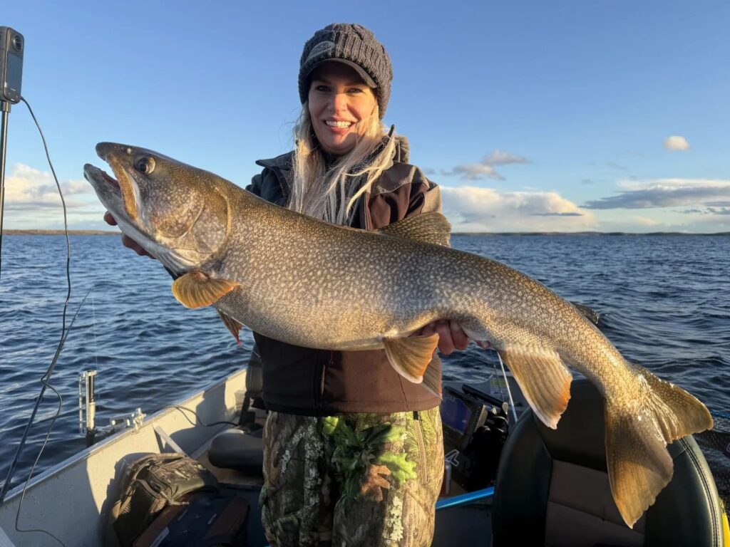 Nicole Stone with a big lake trout at the Bakers Narrows Kamuchawie Lake outpost