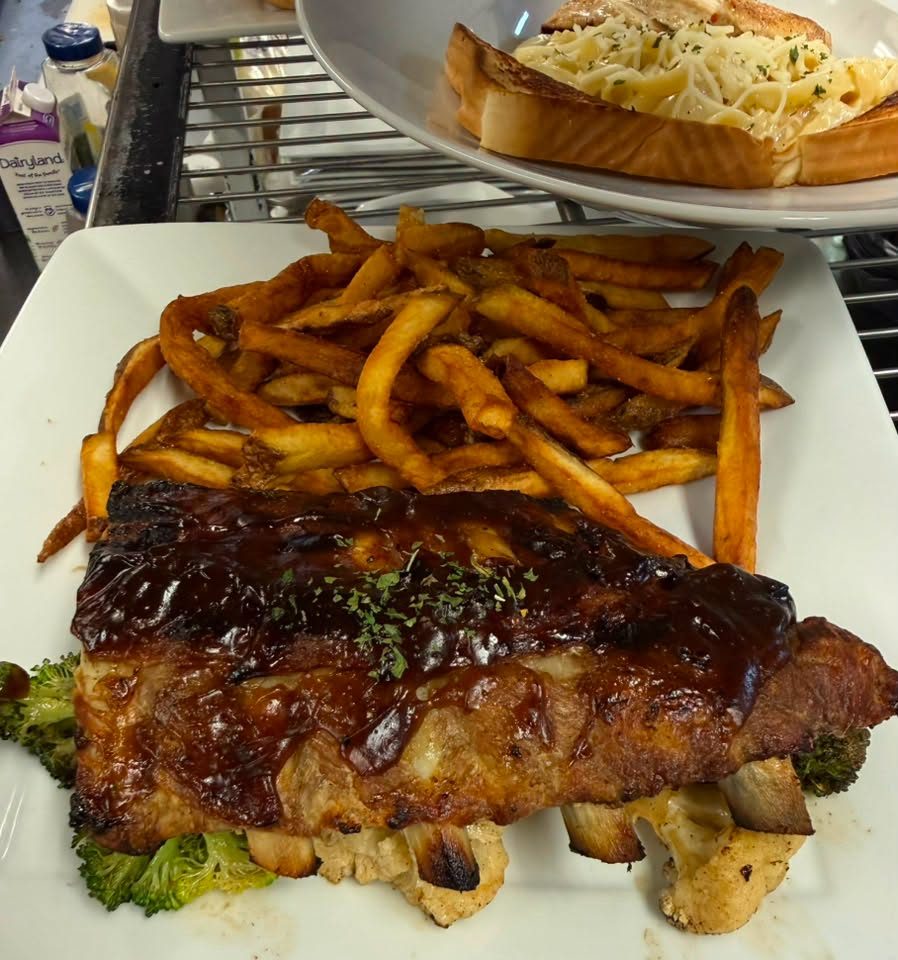 BBQ pork ribs with fresh-cut fries and roasted vegetables from Bakers Narrows Lodge