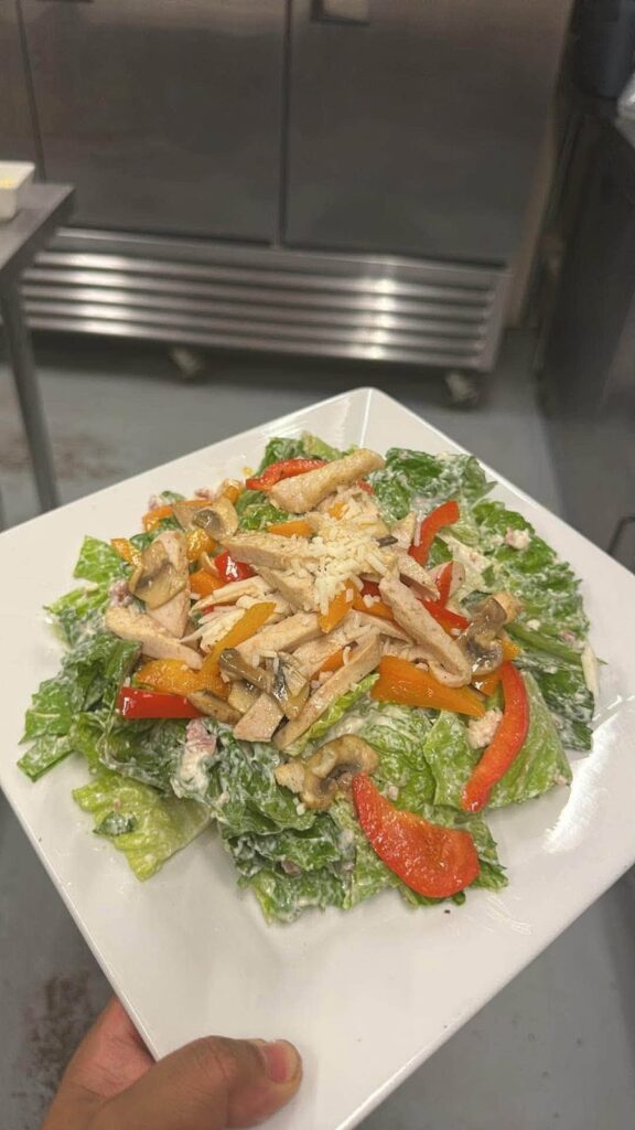 Grilled chicken salad with romaine, peppers, mushrooms and cheese from Bakers Narrows Lodge