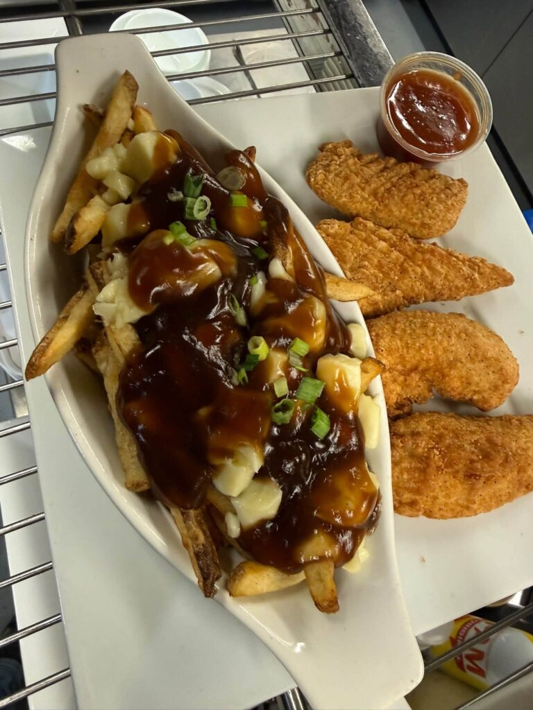 Poutine and chicken tenders, a family favourite at The Club House near Flin Flon