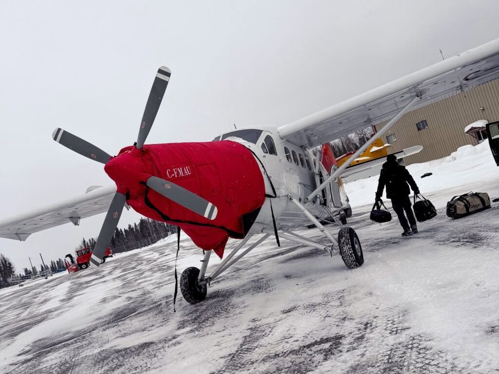 Ski plane with engine cover loading gear for the winter flight to Kamuchawie Lake